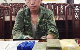 Thầy giáo ôm súng vận chuyển 15 bánh heroin