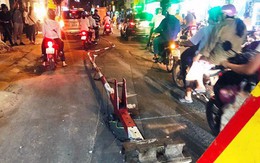Ôtô húc văng barie tàu hỏa ở Sài Gòn, giao thông hỗn loạn