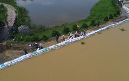 Ngập lụt ở Hà Nội: Mưa to trở lại, vạn dân đê tả sông Bùi trong tình trạng căng thẳng
