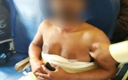 Hành khách khỏa thân đi lại trên máy bay