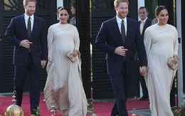 Meghan bị soi khoảnh khắc "cướp" hoa của chồng, coi Hoàng tử Harry như tùy tùng và lộ vòng bụng bất thường