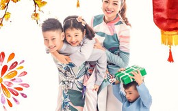 Bảo Nam được cha dượng ôm chặt trong ảnh Tết gia đình