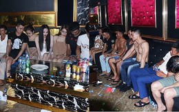 6 cô gái vui vẻ với nhóm đàn ông cởi trần trong phòng karaoke chứa ma túy