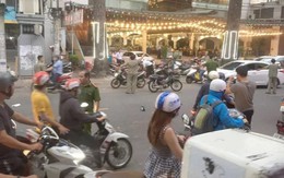 Tạm giữ 2 cha con liên quan vụ chặt tay người ở Sài Gòn