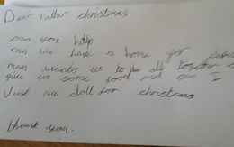 Bé gái xin ông già Noel mang đồ ăn cho gia đình