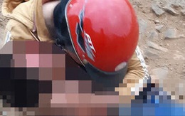 Mẹ đau đớn ôm thi thể con gào khóc sau tai nạn trên quốc lộ