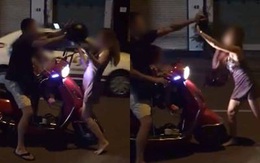 Chồng đánh vợ giữa đường vì 'đi nhậu không xin phép'