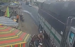 Thót tim xe tải vượt ẩu, hất văng 3 mẹ con thoát chết trong gang tấc