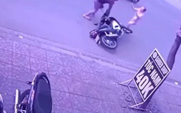 Lao ra đường chặn đầu kẻ trộm xe máy trước quán trà sữa, cô gái suýt bị "phản đòn"