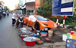 Xôn xao hình ảnh người đàn ông mang siêu xe Lamborghini đắt giá đi bán cá lề đường