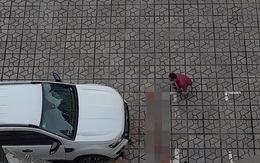 Hà Nội: Người dân tá hỏa phát hiện thi thể người phụ nữ dưới gầm ô tô ở Cung trí thức
