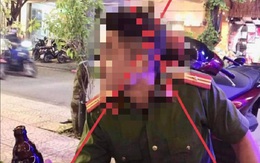 Mặc đồ công an ngồi uống bia để chụp ảnh sống ảo, nam thanh niên nhận cái kết đắng