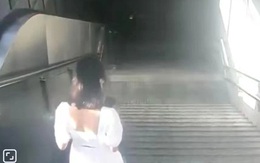 Cô gái mải bấm điện thoại ngã phô cả nội y, thanh niên đi ngang qua nhưng ngó lơ vì một lý do được dân mạng đồng tình