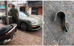 Sắt trên trụ đèn rơi vỡ kính xe Porsche, chủ xe ''bay'' ngay hàng chục triệu đồng