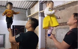 Bố nâng con gái 9 tháng tuổi bằng 1 tay, bị nhắc nhở liền có phản pháo gây bức xúc