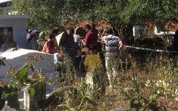 Bé trai sơ sinh cuộn trong bọc nilông dính máu ở nghĩa trang