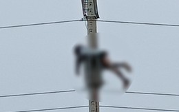 Người đàn ông bị điện giật cháy đen, cơ thể treo lơ lửng trên cột