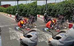 Xúc động hình ảnh người phụ nữ đi chân trần, thay đôi giày mới của mình cho chú bán hàng rong tàn tật bên đường