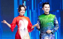 Bỏ qua ồn ào, Vy Oanh làm người mẫu trong BST áo dài Việt Hùng 