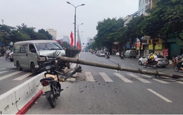 Ô tô đâm gãy cột điện gây ùn tắc trên đường Giải Phóng, Hà Nội