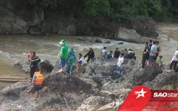 Mải chơi đùa chụp ảnh, 2 thiếu nữ rơi xuống thác nước mất tích