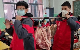 Thưởng Tết bằng thịt lợn và cá sống ở Trung Quốc