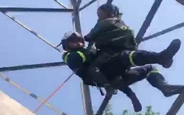 Hà Nội: Cảnh sát giải cứu người phụ nữ leo cột điện cao 25m