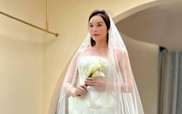 Lý Nhã Kỳ tung ảnh thử váy cưới, danh tính 'nửa kia' làm khán giả xôn xao