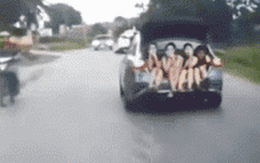 Tài xế tiết lộ nguyên nhân chở 4 cô gái ngồi vắt vẻo sau cốp xe
