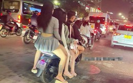 Hà Nội: Xử phạt lái xe ôm công nghệ 'kẹp 4' trên đường Trần Duy Hưng