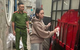 Bắt cô gái tạt sơn nhà người yêu cũ