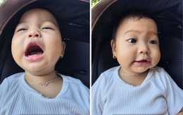 Biểu cảm hài hước của con gái H'Hen Niê khi 'khoe' chiếc răng sữa đầu tiên