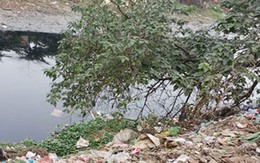 Thi nhau lấn chiếm hành lang sông Nhuệ