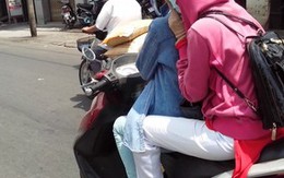 Phụ nữ Sài Gòn che kín tránh nắng như giữa sa mạc