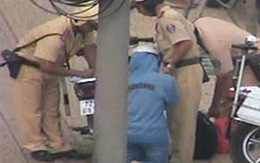 Cô gái trẻ quỳ xuống đường van xin CSGT