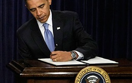 Chùm ảnh: Ngày làm việc đầu tiên của Obama