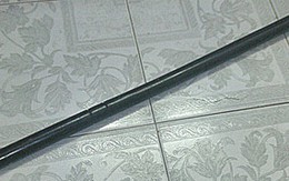 Chồng dùng gậy đánh vợ đến chết