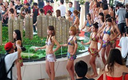 100 cô gái mặc bikini mời mua nhà