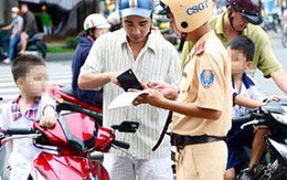 Quy định trẻ em đội mũ BH: Cảnh sát sẽ ghi hình vi phạm
