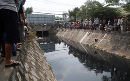 Cánh tay còn nguyên máu bị vứt dưới kênh