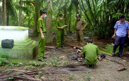 Người đàn bà chết cháy cạnh mộ chồng