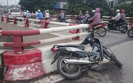 Đâm thành cầu Chương Dương, cô gái bay xuống đất