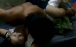 Cưỡng hiếp chị dâu họ ngay trước mắt 2 cháu nhỏ đang van xin