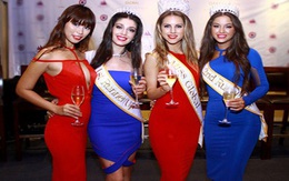 Hà Anh diện váy xẻ ngực gợi cảm bên các hoa hậu Miss Global