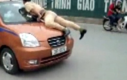 Taxi lại hất cảnh sát lên nắp capô