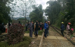 Đi chợ về bị xe lửa cán chết