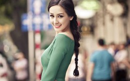 Mai Phương Thúy trẻ trung với áo dài hở cổ
