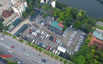 Hà Nội: Hơn một thập kỷ 'đắp chiếu', đất vàng quy hoạch công viên thành bãi xe không phép quy mô lớn