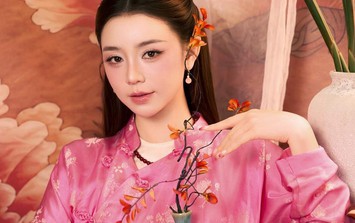 Quỳnh Kool gây chú ý khi diện áo dài hồng phấn