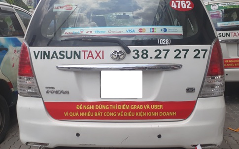 Cuộc chiến taxi truyền thống và Grab, Uber: “Gót chân Asin” dừng ở chữ… tiền!